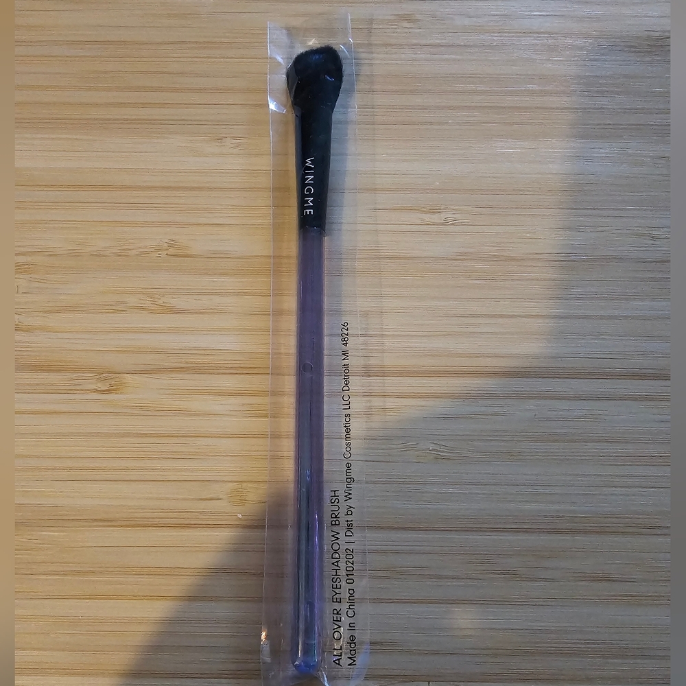 Wing me brush